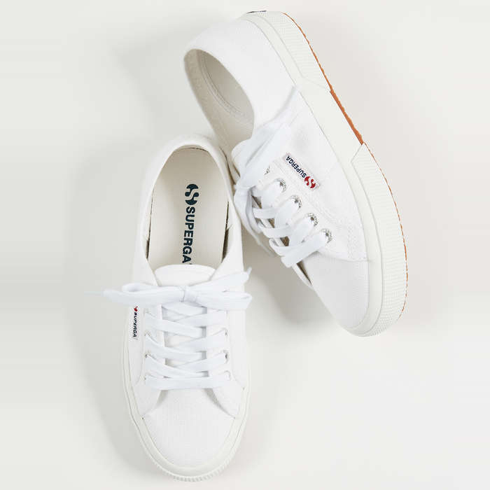 branded white sneakers